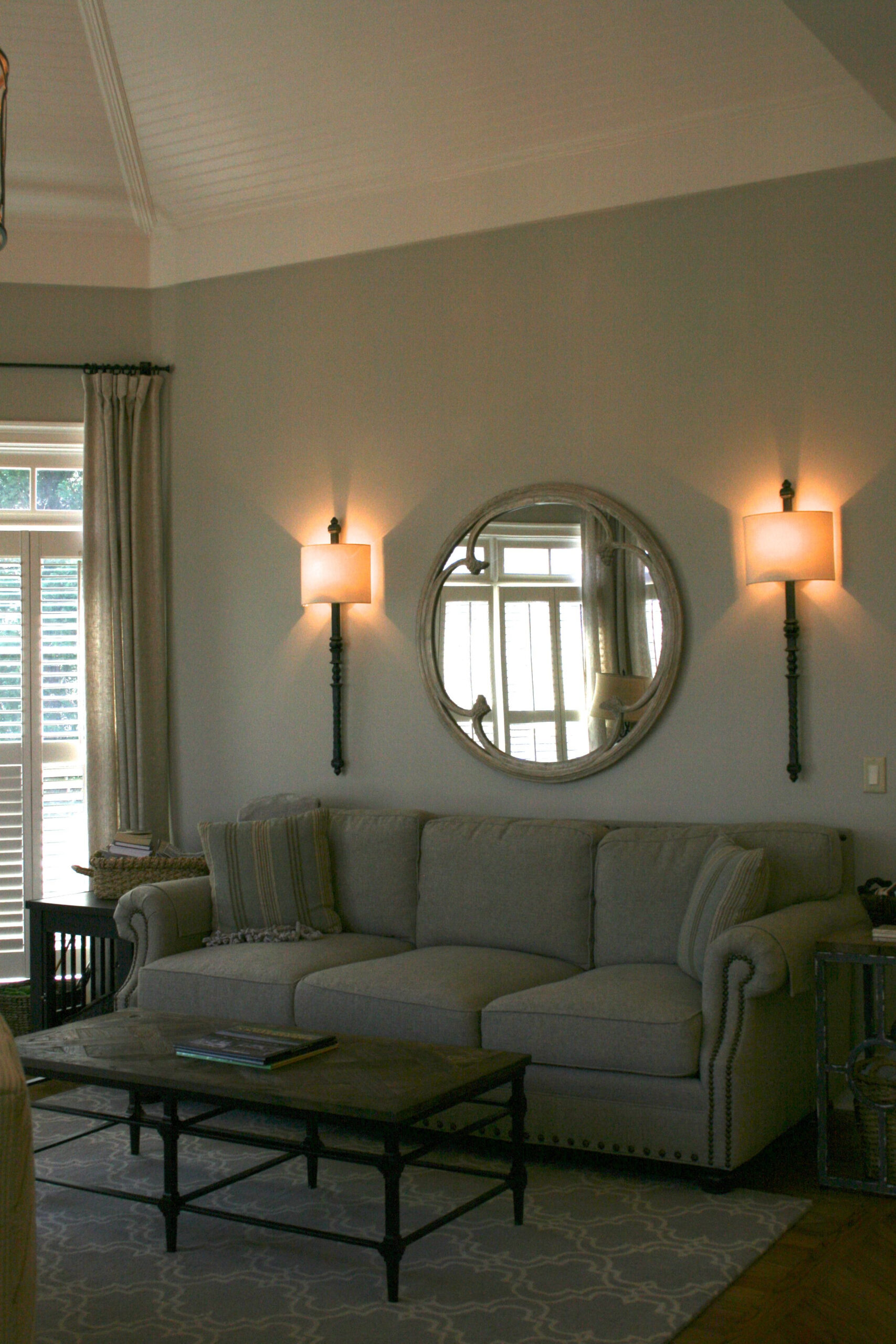 After~Ballard Designs Wall Sconces & Arhaus Mirror Over New Nailhead ... regarding The Ultimate Guide to Wiring Sconces Above Your Sofa