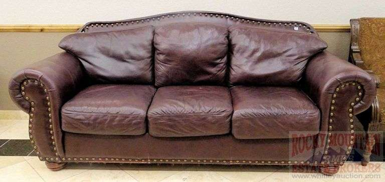 Dark Brown Leather Sofa With Curved Back, Rolled Arms, Upholstery Tack ... for Decoding the Appeal of the Vincenza 85" Dark Brown Leather Sofa