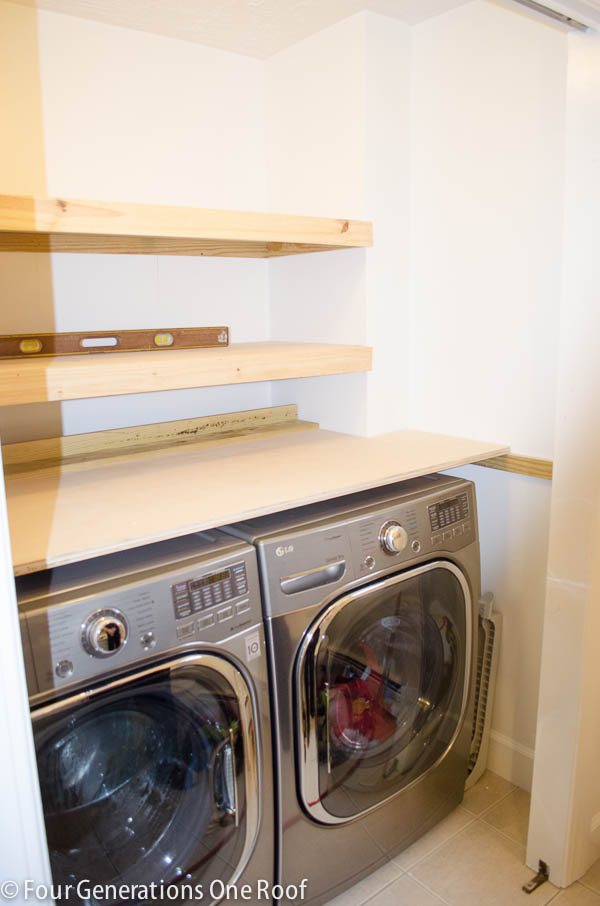 Inexpensive Laundry Room Shelving in How One Texan Built Her Laundry Room Shelves for Just $115