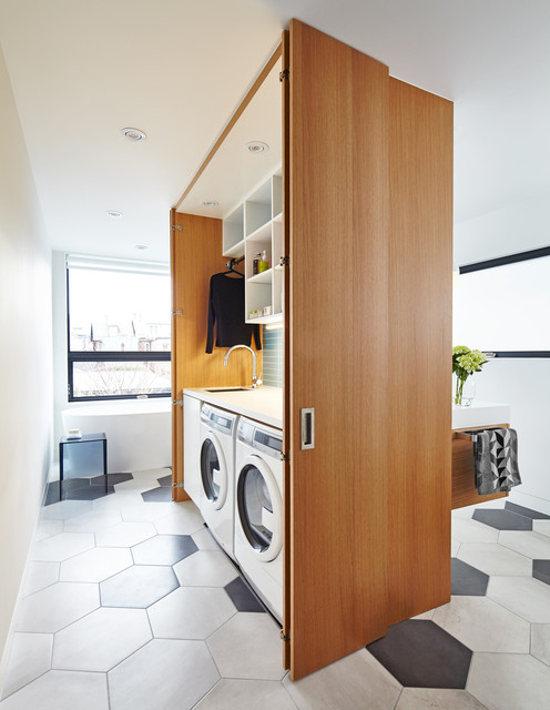 A Clever Storage Box Hides A Laundry Room Inside A Bath inside A Clever Storage Box Hides A Laundry Room Inside A Bath