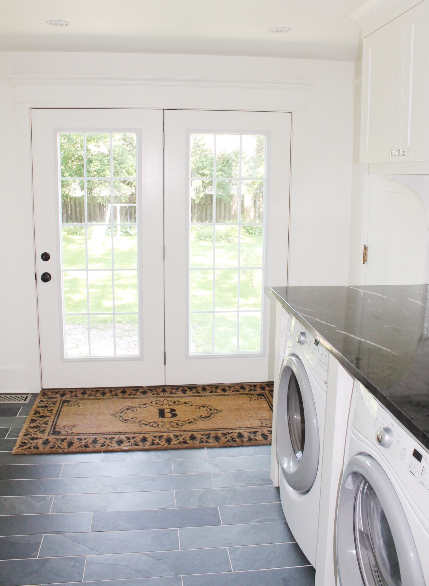 Classic Black And White Laundry Room Renovation - The Leslie Style with regard to Loads Of Function In A Classic Black-And-White Laundry Room
