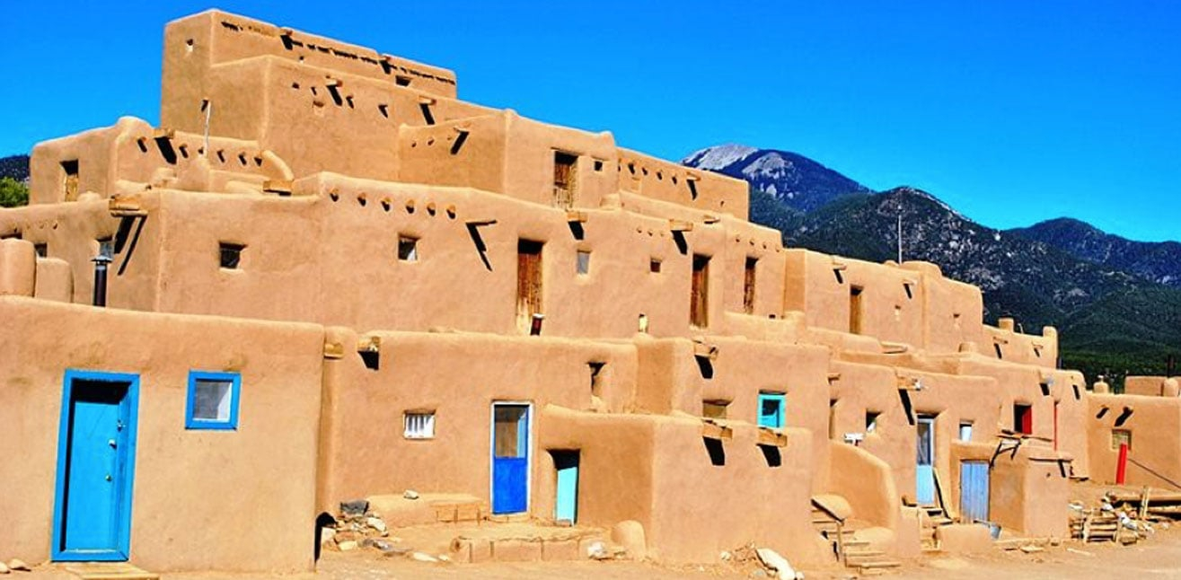 Taos Pueblo: Evoking The Story Of Ancestral Puebloans For 1000 Years ... in Understanding the Features of the Taos 60" Wide TV Console Canyon Brown