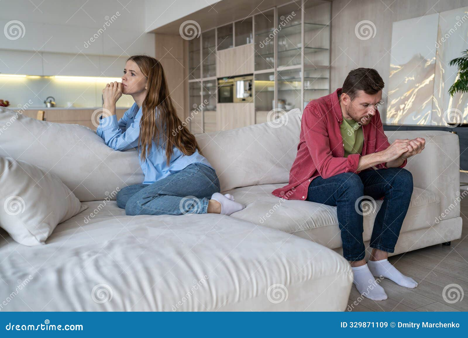 Sad Unhappy Married Couple In Quarrel Sitting On Sofa Couch In Living ... throughout How to Navigate Family Conflicts Without Losing Relationships