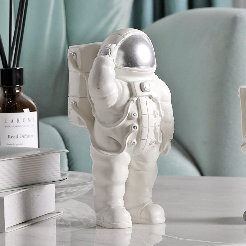 White Astronaut Figure Phone Holders Cosmonaut Sta... – Grandado inside How White Astronaut Figurines Transform Small Space Storage Solutions